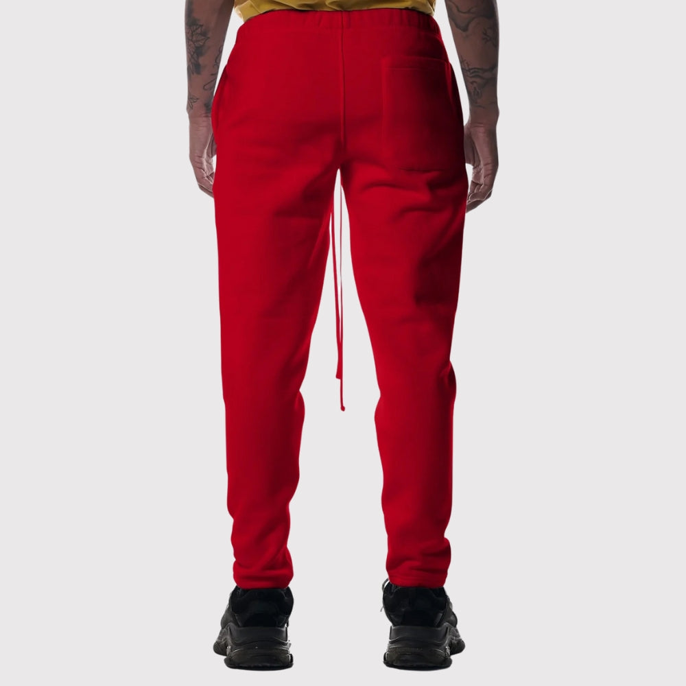 HERMAN&CO UNISEX TAPERED JOGGERS - Tracksuit bottoms - dark red 